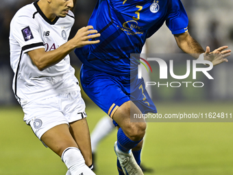 Youcef Atal of Al Sadd SC battles for the ball with Saman Fallah of Esteghlal FC during the AFC Champions League elite west football match b...