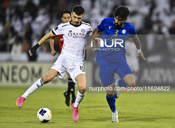 Rafael Sebastian Mujica Garcia of Al Sadd SC battles for the ball with Saman Fallah of Esteghlal FC during the AFC Champions League elite we...