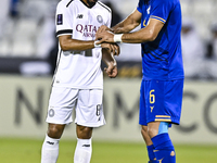 Akram Hassan Afif of Al Sadd SC and Iman Salimi of Esteghlal FC react during the AFC Champions League elite west football match between Qata...