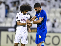 Akram Hassan Afif of Al Sadd SC and Iman Salimi of Esteghlal FC react during the AFC Champions League elite west football match between Qata...