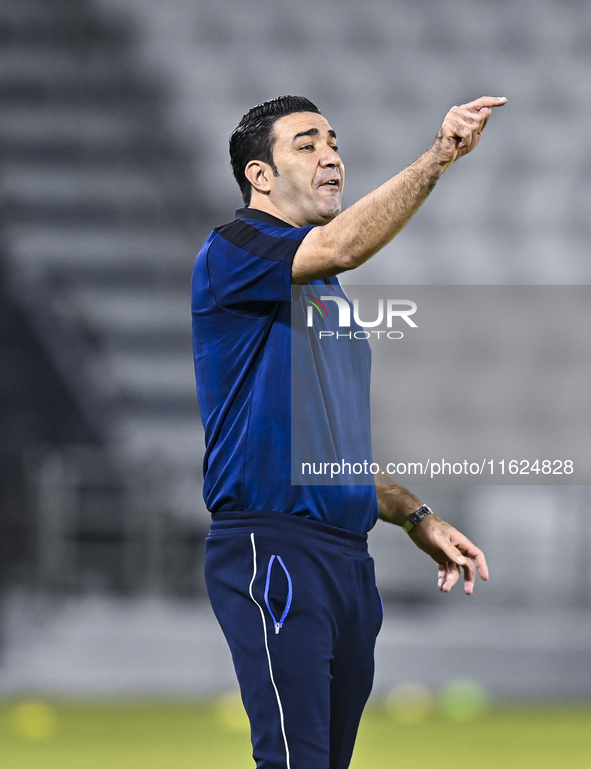 Esteghlal FC Head Coach, Javad Nekounam, reacts during the AFC Champions League elite west football match between Qatar's Al Sadd SC and Ira...