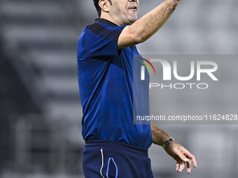 Esteghlal FC Head Coach, Javad Nekounam, reacts during the AFC Champions League elite west football match between Qatar's Al Sadd SC and Ira...