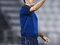 Esteghlal FC Head Coach, Javad Nekounam, reacts during the AFC Champions League elite west football match between Qatar's Al Sadd SC and Ira...