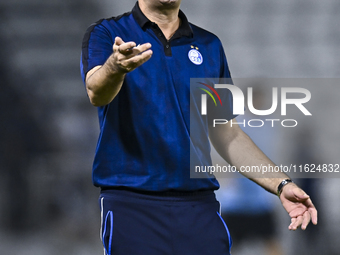 Esteghlal FC Head Coach, Javad Nekounam, reacts during the AFC Champions League elite west football match between Qatar's Al Sadd SC and Ira...