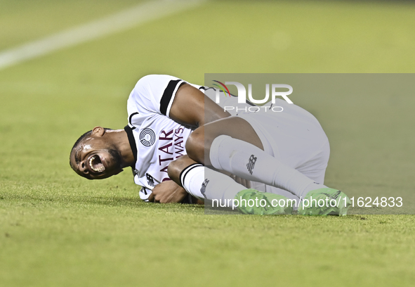 Pedro Miguel Correia of Al Sadd SC suffers an injury during the AFC Champions League elite west football match between Qatar's Al Sadd SC an...