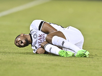 Pedro Miguel Correia of Al Sadd SC suffers an injury during the AFC Champions League elite west football match between Qatar's Al Sadd SC an...