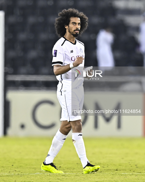 Akram Hassan Afif of Al Sadd SC celebrates after scoring the second goal during the AFC Champions League elite west football match between Q...