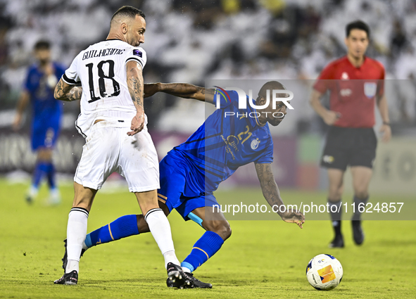 Guilherme Torres of Al Sadd SC battles for the ball with Gael Kakuta of Esteghlal FC during the AFC Champions League elite west football mat...