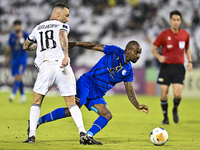 Guilherme Torres of Al Sadd SC battles for the ball with Gael Kakuta of Esteghlal FC during the AFC Champions League elite west football mat...