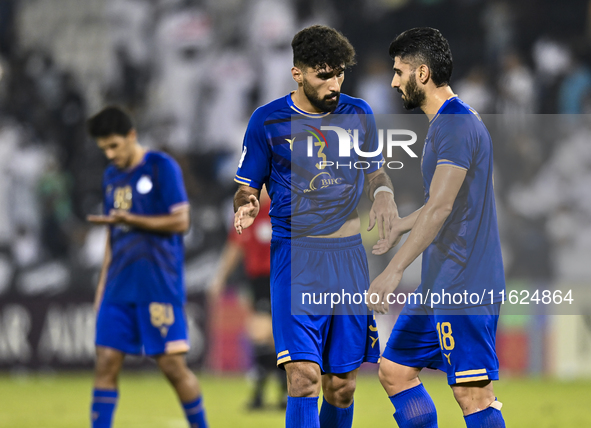 Players of Esteghlal FC express their dejection after the AFC Champions League elite west football match between Qatar's Al Sadd SC and Iran...