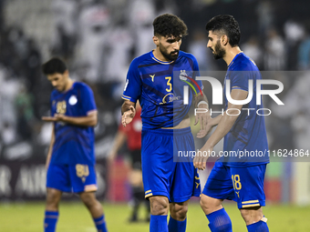 Players of Esteghlal FC express their dejection after the AFC Champions League elite west football match between Qatar's Al Sadd SC and Iran...