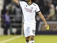 Akram Hassan Afif of Al Sadd SC celebrates after winning the AFC Champions League elite west football match between Qatar's Al Sadd SC and I...