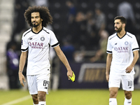 Akram Hassan Afif of Al Sadd SC celebrates after winning the AFC Champions League elite west football match between Qatar's Al Sadd SC and I...