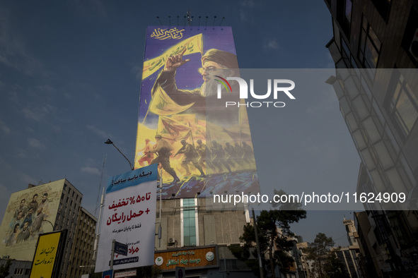 A giant banner featuring a portrait of Lebanon's Hezbollah Secretary General, Hassan Nasrallah, who was killed in an Israeli air strike in t...