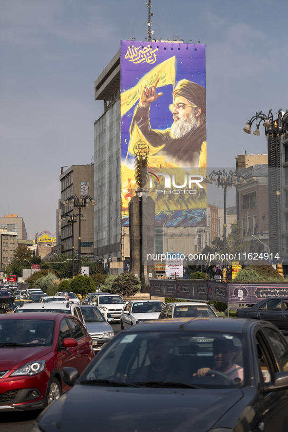 A giant banner featuring a portrait of Lebanon's Hezbollah Secretary General, Hassan Nasrallah, who was killed in an Israeli air strike in t...