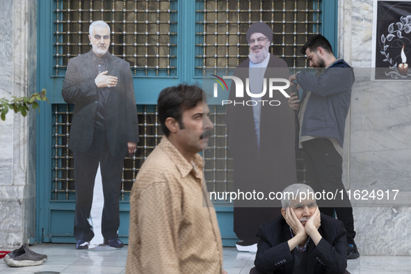 Effigies of Lebanon's Hezbollah Secretary General, Hassan Nasrallah, and former commander of the Islamic Revolutionary Guard Corps' (IRGC) Q...