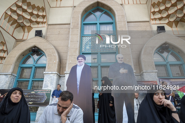 Effigies of Lebanon's Hezbollah Secretary General, Hassan Nasrallah, and former commander of the Islamic Revolutionary Guard Corps' (IRGC) Q...