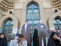 Effigies of Lebanon's Hezbollah Secretary General, Hassan Nasrallah, and former commander of the Islamic Revolutionary Guard Corps' (IRGC) Q...