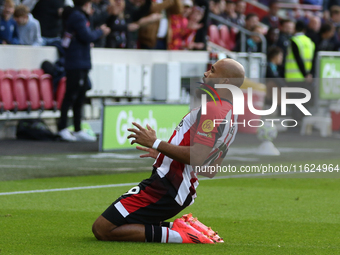 Bryan Mbeumo of Brentford scores the opening goal during the Premier League match between Brentford and West Ham United at the Gtech Communi...