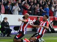 Brentford's Bryan Mbeumo scores in the first minute during the Premier League match between Brentford and West Ham United at the Gtech Commu...