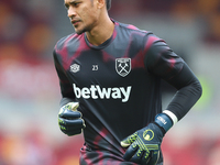 Alphonse Areola of West Ham warms up during the Premier League match between Brentford and West Ham United at the Gtech Community Stadium in...