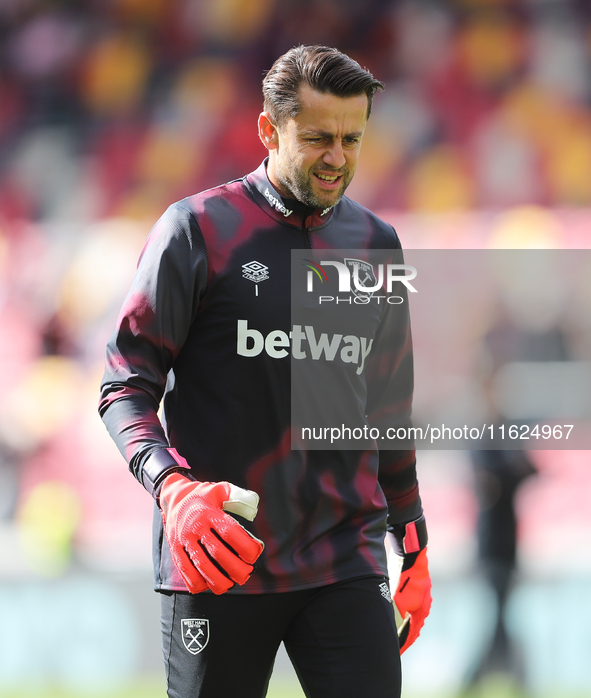 West Ham's number 1 goalkeeper Lukasz Fabianski starts on the bench for the Premier League match between Brentford and West Ham United at th...