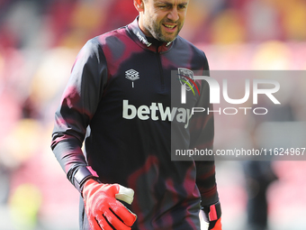 West Ham's number 1 goalkeeper Lukasz Fabianski starts on the bench for the Premier League match between Brentford and West Ham United at th...