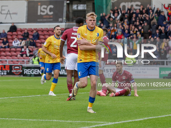 Will Evans celebrates after scoring for Mansfield Town to take the lead to make it 1-0 against Northampton Town during the second half of th...