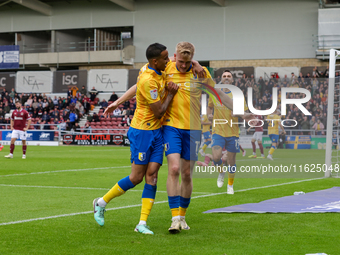 Will Evans celebrates after scoring for Mansfield Town to take the lead to make it 1-0 against Northampton Town during the second half of th...