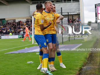 Will Evans celebrates after scoring for Mansfield Town to take the lead to make it 1-0 against Northampton Town during the second half of th...