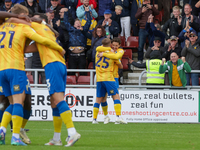 Aaron Lewis celebrates after scoring for Mansfield Town, extending their lead to 2-0 against Northampton Town during the second half of the...