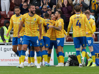 Aaron Lewis celebrates after scoring for Mansfield Town, extending their lead to 2-0 against Northampton Town during the second half of the...