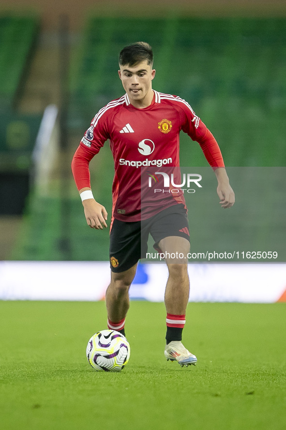 Harry Amass of Manchester United on the ball during the Premier League 2 match between Norwich City and Manchester United at Carrow Road in...