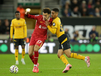 Liverpool's Curtis Jones in action with Joao Gomes of Wolverhampton Wanderers during the Premier League match between Wolverhampton Wanderer...