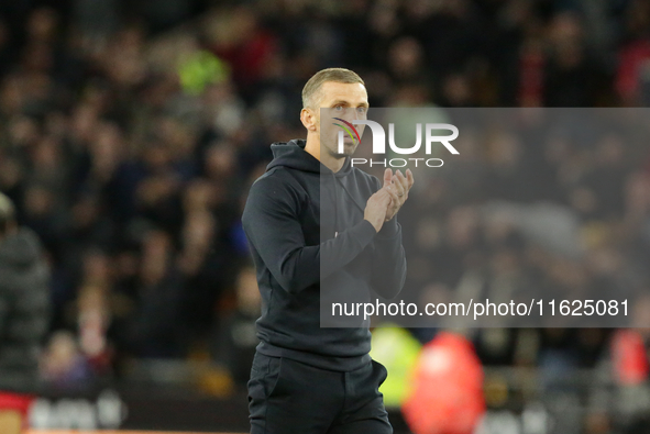 Wolverhampton Wanderers manager Gary O'Neil applauds the home fans after the Premier League match between Wolverhampton Wanderers and Liverp...