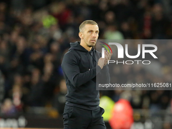 Wolverhampton Wanderers manager Gary O'Neil applauds the home fans after the Premier League match between Wolverhampton Wanderers and Liverp...