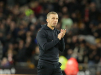 Wolverhampton Wanderers manager Gary O'Neil applauds the home fans after the Premier League match between Wolverhampton Wanderers and Liverp...