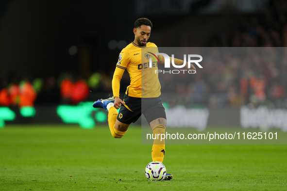 Matheus Cunha of Wolverhampton Wanderers is in action during the Premier League match between Wolverhampton Wanderers and Liverpool at Molin...