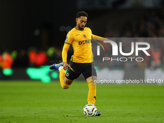 Matheus Cunha of Wolverhampton Wanderers is in action during the Premier League match between Wolverhampton Wanderers and Liverpool at Molin...