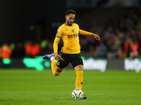 Matheus Cunha of Wolverhampton Wanderers is in action during the Premier League match between Wolverhampton Wanderers and Liverpool at Molin...