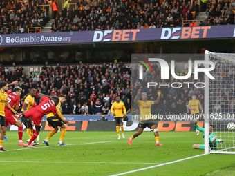 Liverpool's Ibrahima Konate heads them into a 1-0 lead during the Premier League match between Wolverhampton Wanderers and Liverpool at Moli...