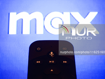 Max app displayed on a tv screen and a remote control are seen in this illustration photo taken in Krakow, Poland on September 30, 2024. (