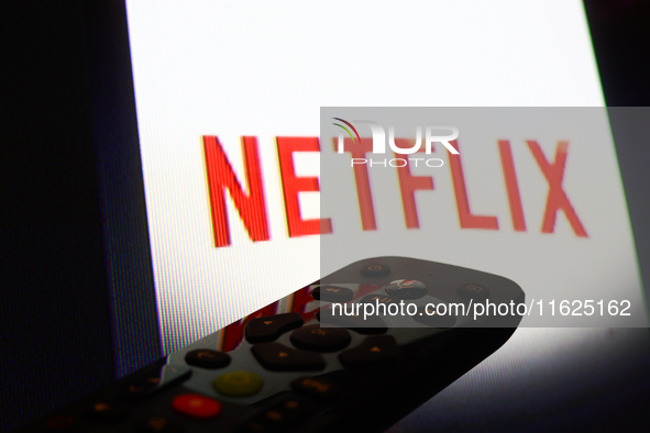 Netflix app displayed on a tv screen and a remote control are seen in this illustration photo taken in Krakow, Poland on September 30, 2024....