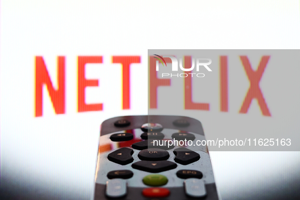 Netflix app displayed on a tv screen and a remote control are seen in this illustration photo taken in Krakow, Poland on September 30, 2024....