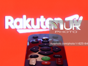 Rakuten TV app displayed on a tv screen and a remote control are seen in this illustration photo taken in Krakow, Poland on September 30, 20...