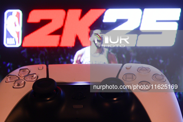 NBA 2K25 displayed on a tv screen and  DualSense controller are seen in this illustration photo taken in Krakow, Poland on September 30, 202...