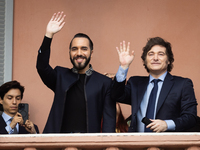 Argentina's President Javier Milei and El Salvador's President Nayib Bukele gesture from a balcony of the Casa Rosada Government House in Bu...