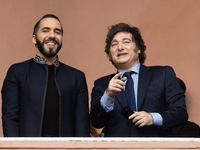 Argentina's President Javier Milei and El Salvador's President Nayib Bukele gesture from a balcony of the Casa Rosada Government House in Bu...