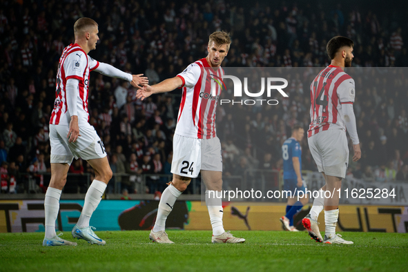 David Olafsson, Jakub Jugas, and Ajdin Hasic participate in the game between KS Cracovia and Stal Mielec in Krakow, Poland, on September 30,...