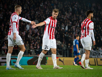 David Olafsson, Jakub Jugas, and Ajdin Hasic participate in the game between KS Cracovia and Stal Mielec in Krakow, Poland, on September 30,...